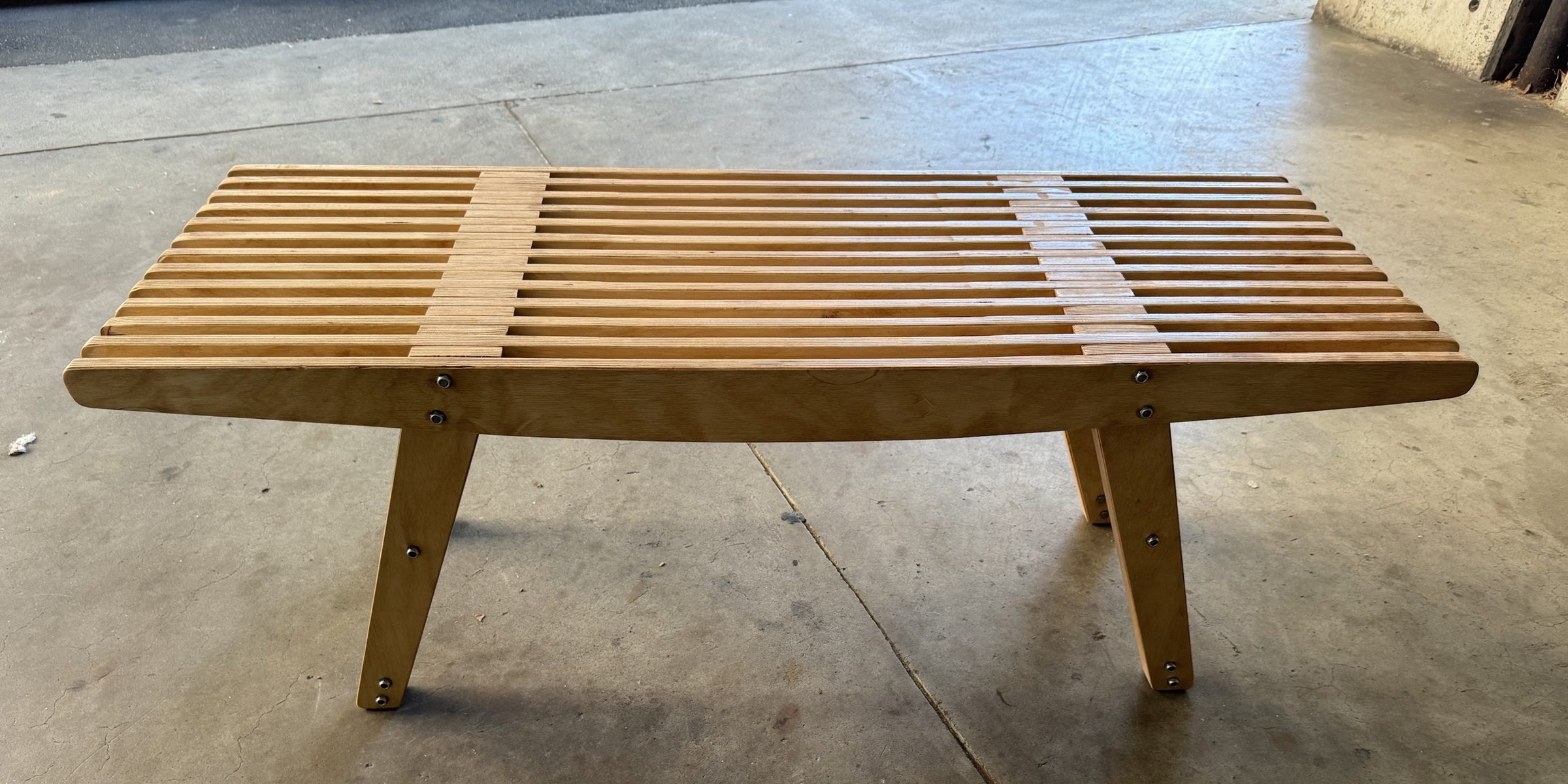 The bench from the back, straight on, in daylight